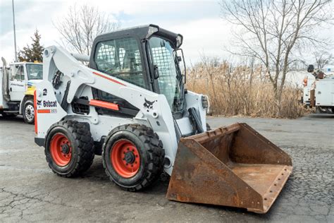 is it worth buying a skid steer|buy a used skid steer.